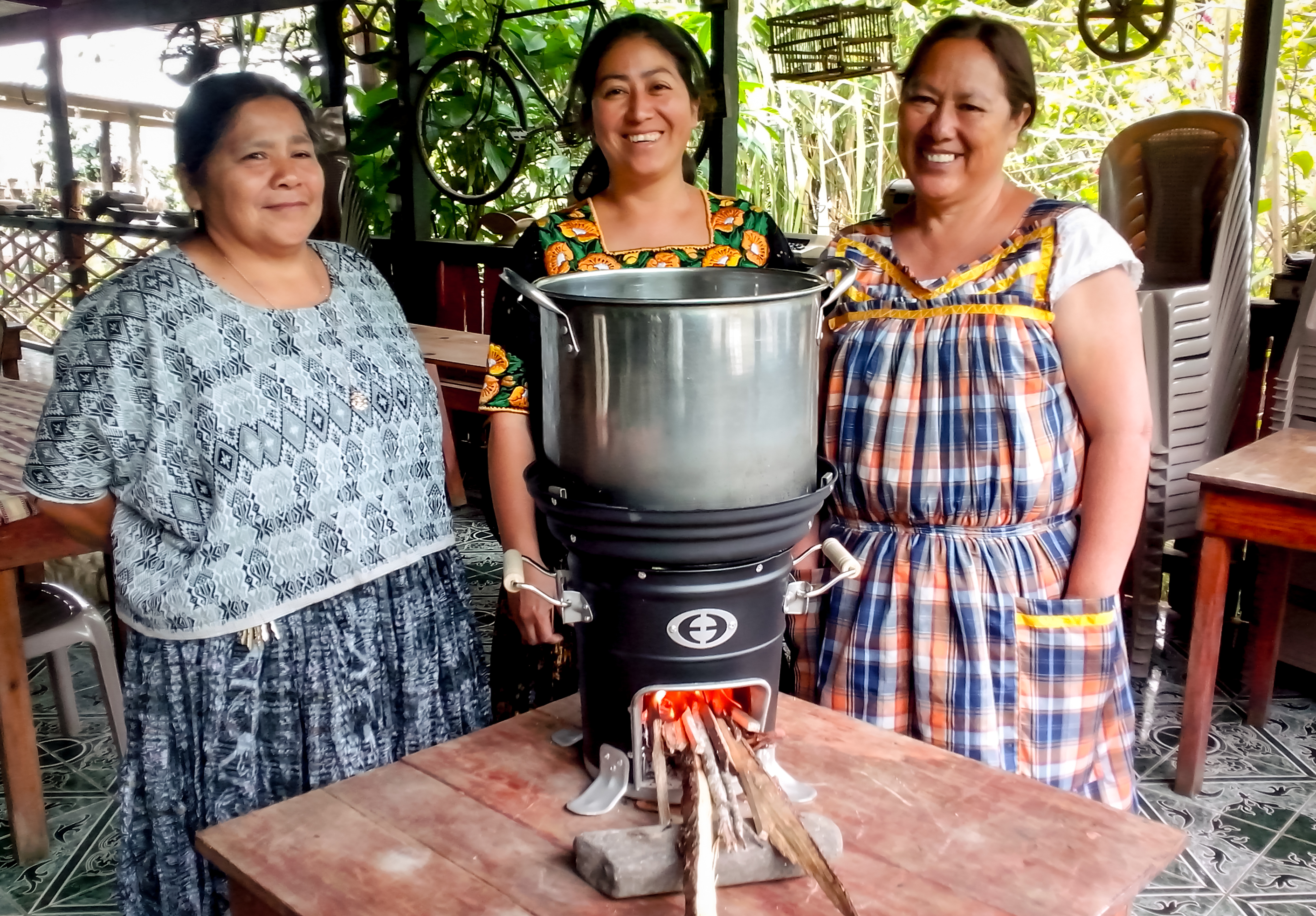 Calvert Foundation’s Community Investment Notes funnel money to community development organizations like Envirofit, which provides affordable, energy-efficient, durable cookstoves to people in developing countries, like these women in Honduras. | Photo from Envirofit