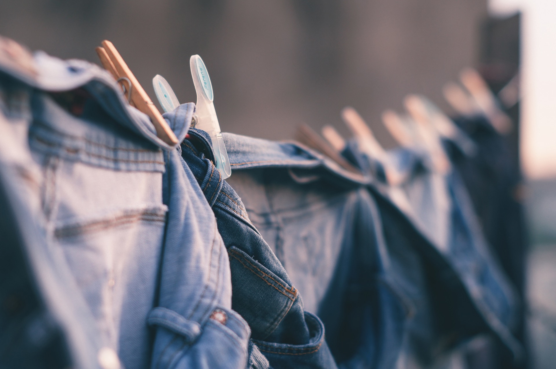 a clothing company produces a new line of inexpensive jeans