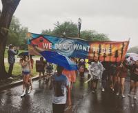 Youth marchers carry a sign that reads, "we don't want to die" at zero hour climate march