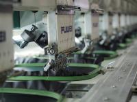 Image: textile machines. Topic: Factory Exploitation and the Fast Fashion Machine
