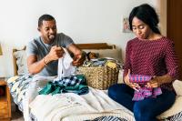 black couple doing laundry