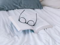 eyeglasses on a book