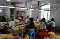 Image: women working in Chinese clothing factory Topic: What You Can Do to End Sweatshops