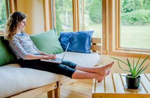 woman sitting on an eco friendly couch