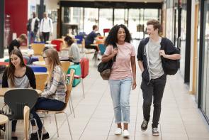 students chat together in a common area