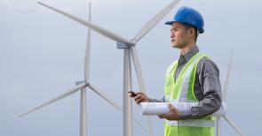 Image of a worker on a wind farm 