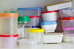 stacks of empty plastic tupperware containers