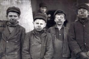 Group of “breaker boys,” who separated coal impurities by hand, in Pittston, Pennsylvania. Photo by Lewis Wickes Hine, 1911.