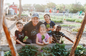 Farmer Kim Aman and Moss Haven Elementary Farm students 