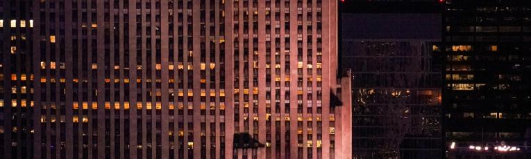 Comcast headquarters in Manhattan at night.