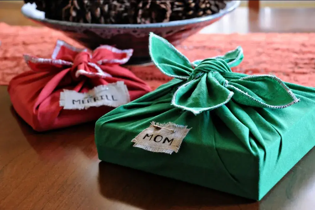 Gifts wrapped in reusable fabric.