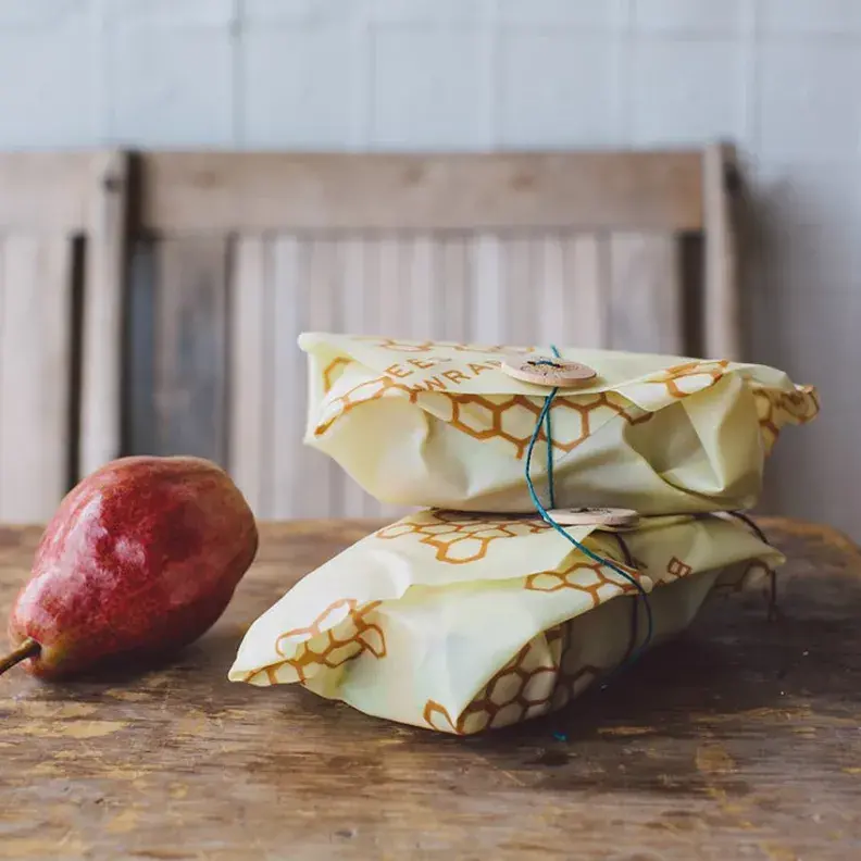 beeswrap sandwiches and a pear