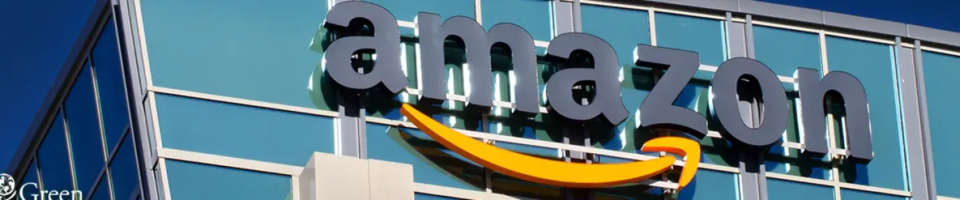 Image: Amazon building. Text: 10 Ways Amazon Violates Human Rights