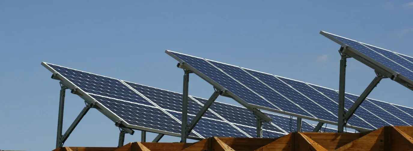 Image: solar panels against cloudless sky. Renewable Energy.