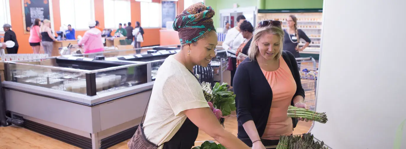 women shop at Daily Table