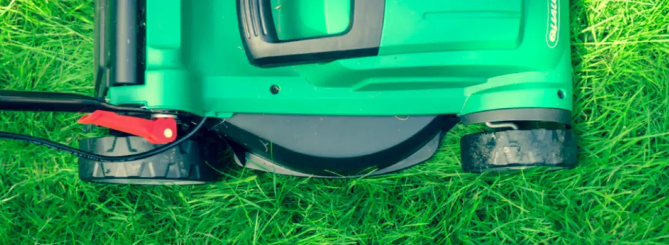 Image: lawn mower on grass. Title: 5 Reasons a Climate Victory Garden is Better than a Lawn