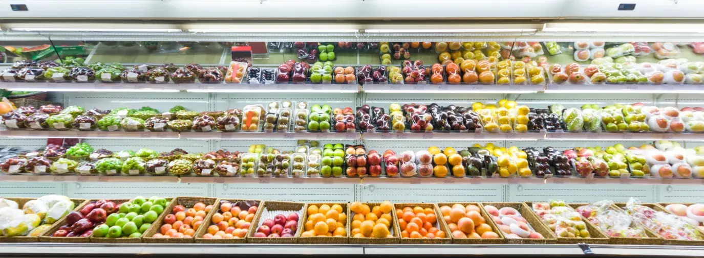 Image: refrigerator at grocery store with produce. Title: “Cool It” Campaign: Groups Take Aim at Walmart’s Massive Refrigerant Leakage Problem