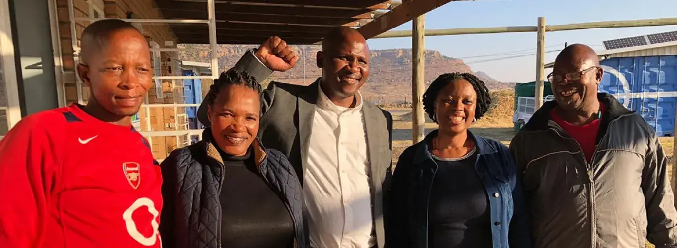 A coalition of workers and feminist organizations after reaching a landmark agreement in Lesotho
