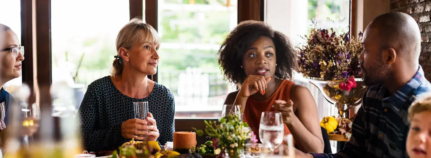 family at thanksgiving table