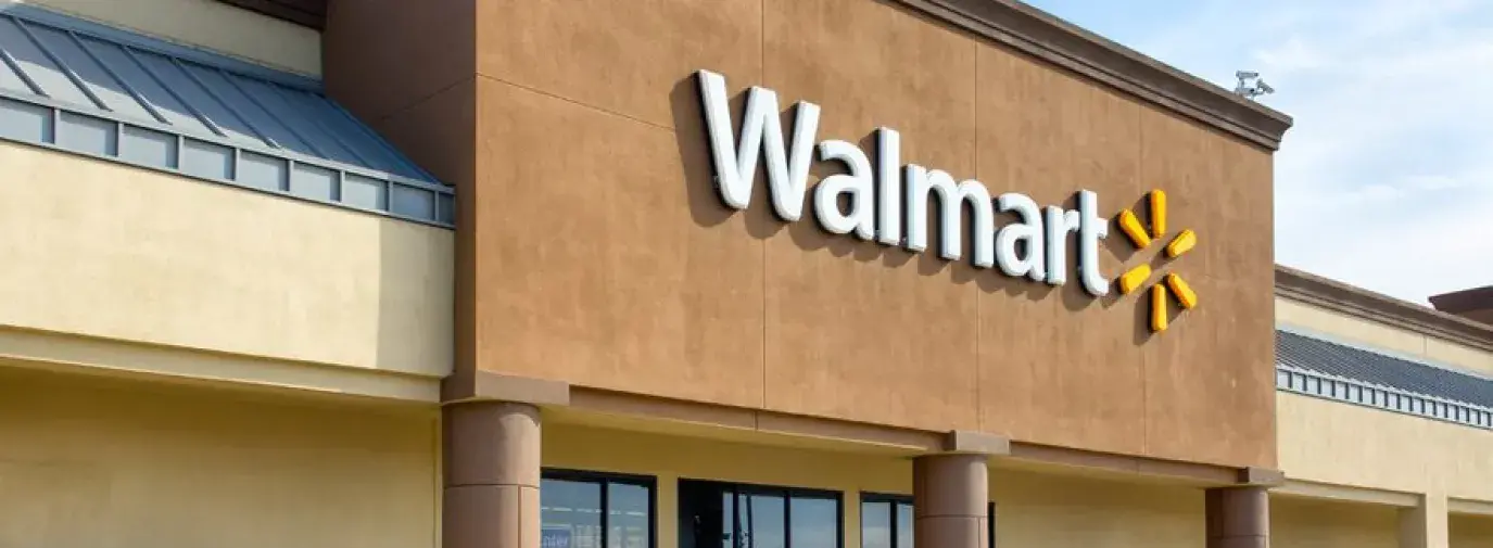 Image: Walmart store with text overlay: Nearly half of Walmart's direct emissions come from potent greenhouse gases called HFCs. Tell them to Cool It for the climate!