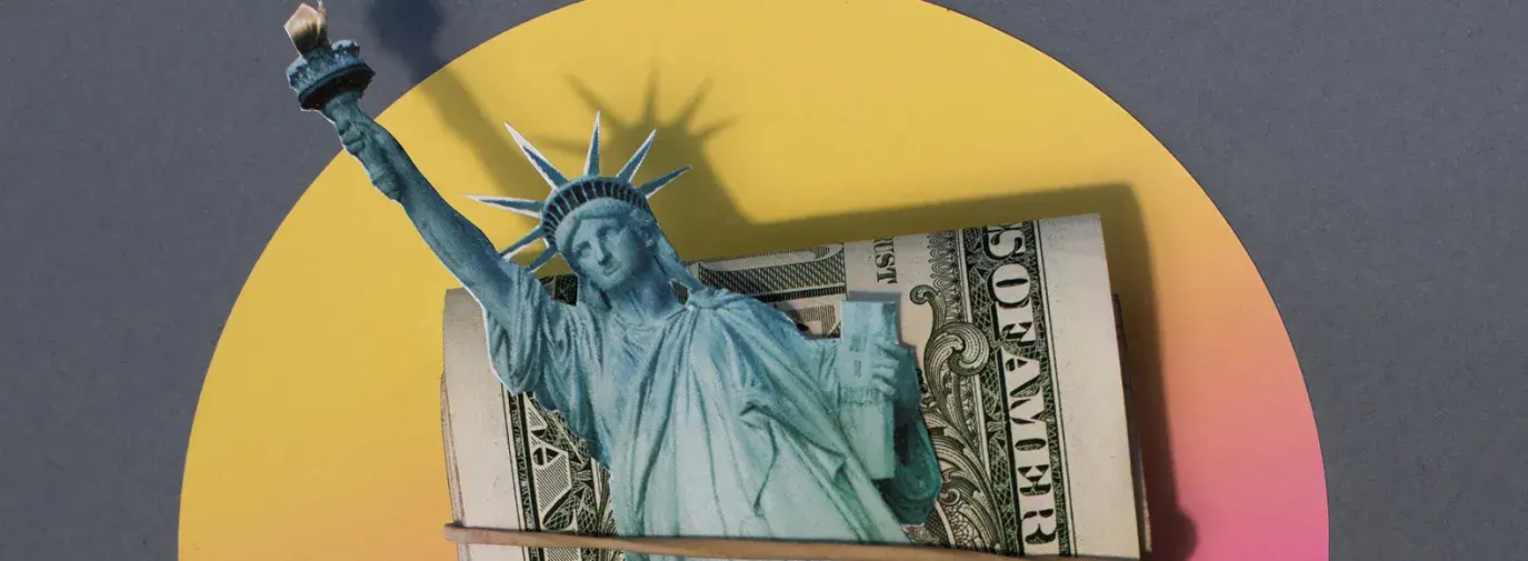a picture of the statue of liberty tied to a pile of money