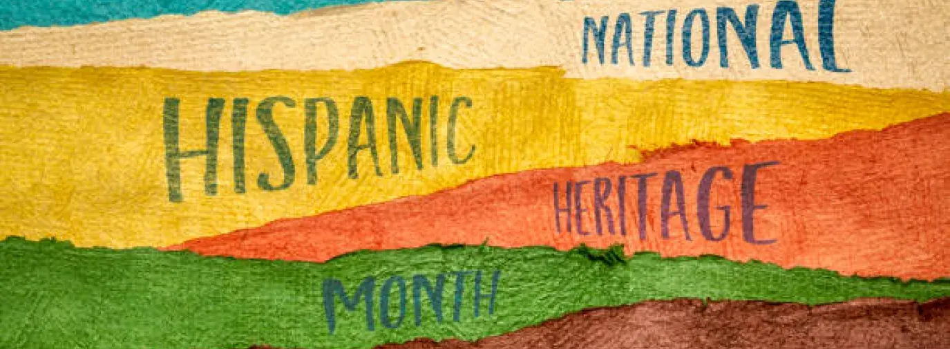 an image of a flag displaying "National Hispanic Heritage Month"