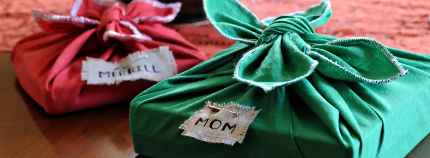 Gifts wrapped in reusable fabric.