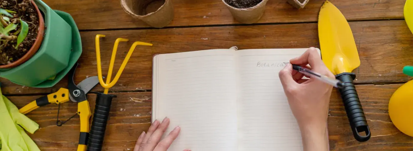 person writing about climate victory gardening