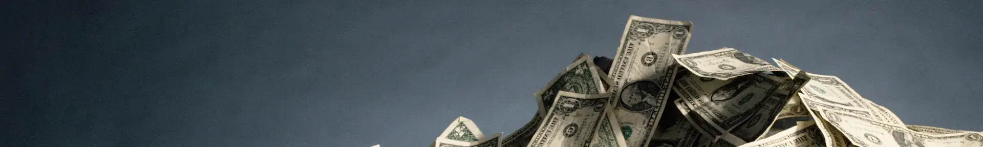 pile of single dollar bills