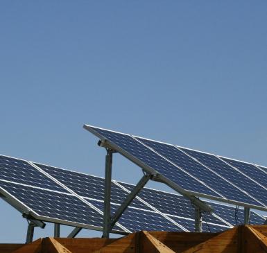 Image: solar panels against cloudless sky. Renewable Energy.