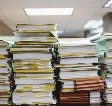 Outdated federal rules force the printing and mailing of billions of sheets of paper every year.