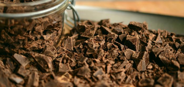 Image: jar of chocolate shavings. Topic: End child labor in cocoa.