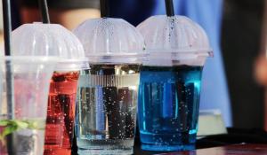Image: colorful drinks in plastic cups. Topic: Greener Paths for Plastics