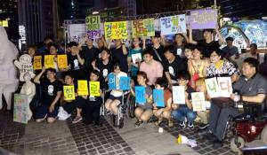 Image: SHARPS protestors in Korea. Title: Samsung Finally Making Progress, Consumers Must Keep the Pressure Up
