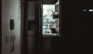 open refrigerator in the dark
